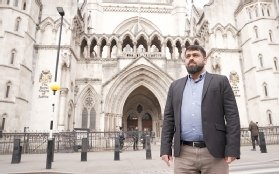 Photo shows Yusuf Al-Jamri outside the High Court