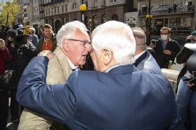 Former subpostmaster Hughie “Noel” Thomas is congratulated outside court after having his conviction quashed in April 2021