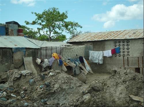 Haiti home covered in mud - Photos: How IT helps relocate refugees